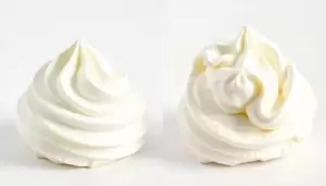 Fresh whipped cream compared to improperly stored whipped cream showing deflation